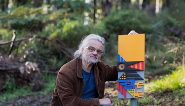 Peter Mcilwain's with one of his Bird Path Markers