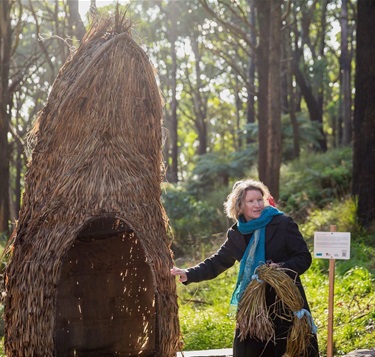 Renate Crow with her Tawny Frogmouth artwork on the Sassafras Art Walk