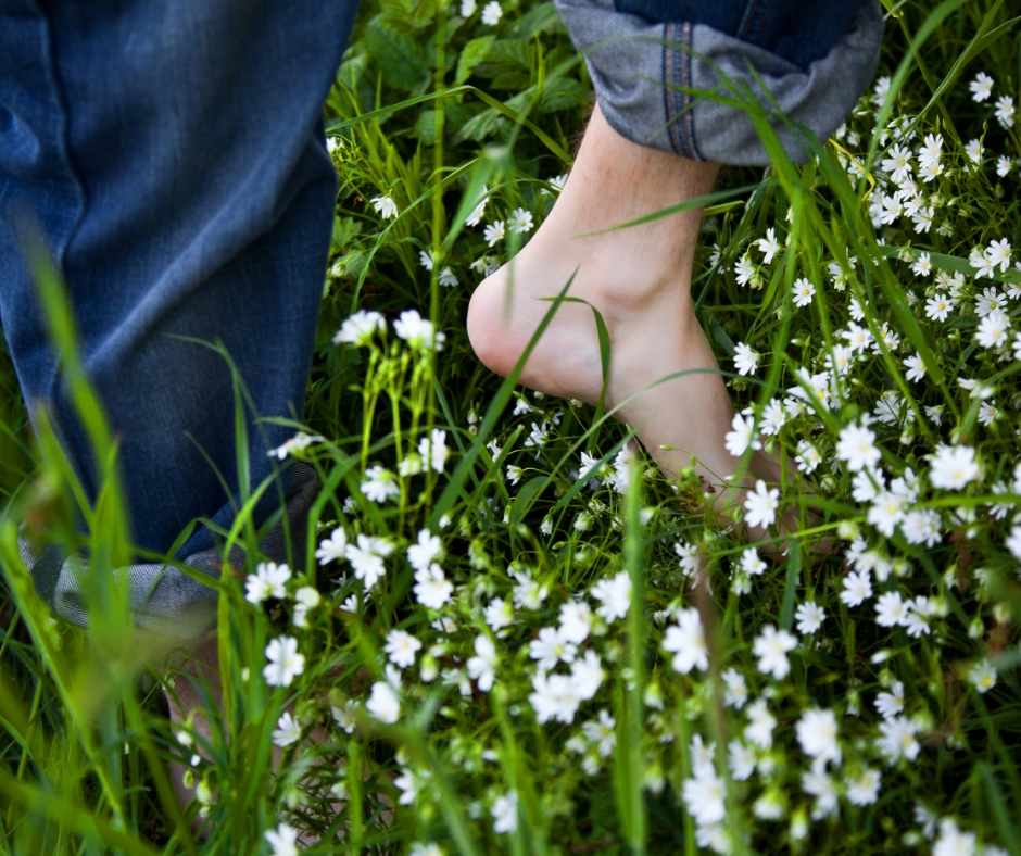 self-care-bare-feet-on-grass.png