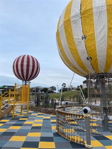 Both Balloons features and small toddles slide