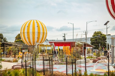 Yellow and White balloon with swings and shelters