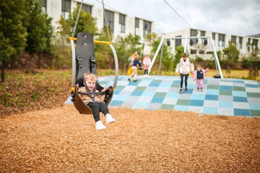 Young Boy on full seat flying fox