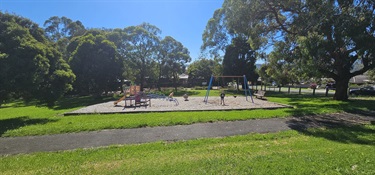 small play equipment at lower side of play space