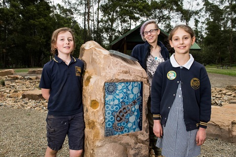 Birdsland reserve opening with school students at indigenous signage