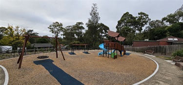 View of play Equipment from back of play space