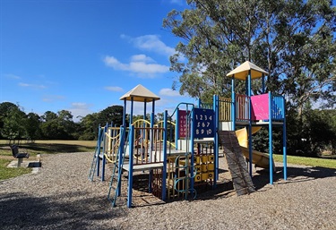 Climbing tower with play elements