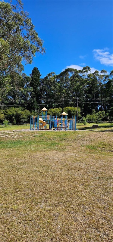 view of play equipment from oval