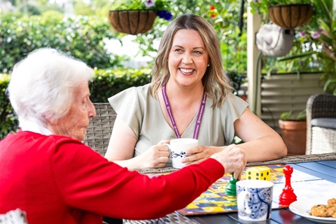 Close-up-of-Caregiver-playing-a-Board-Game-2